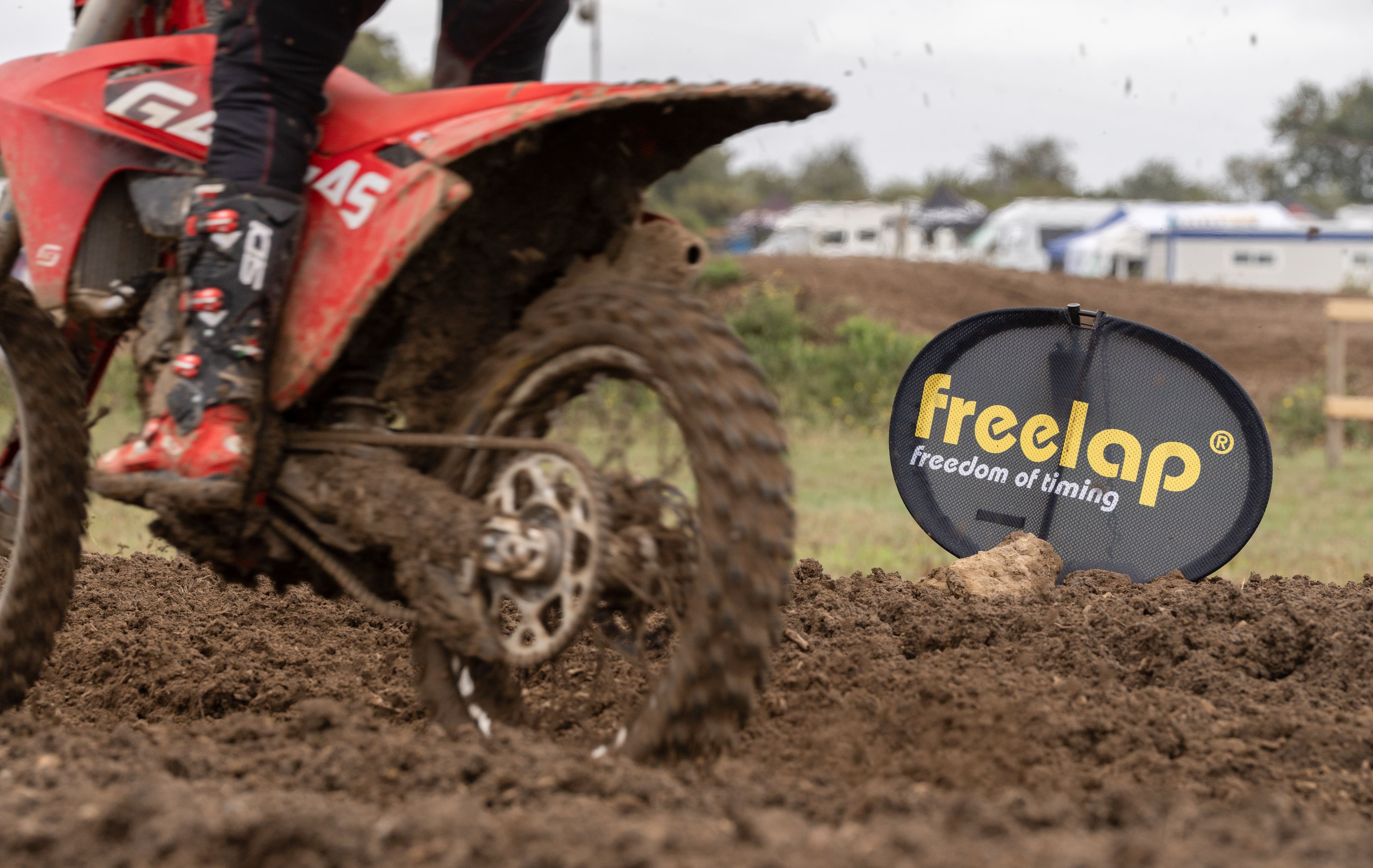 Freelap Canada motocross training – dirt bike rider using wireless timing system for lap time and performance tracking on the course