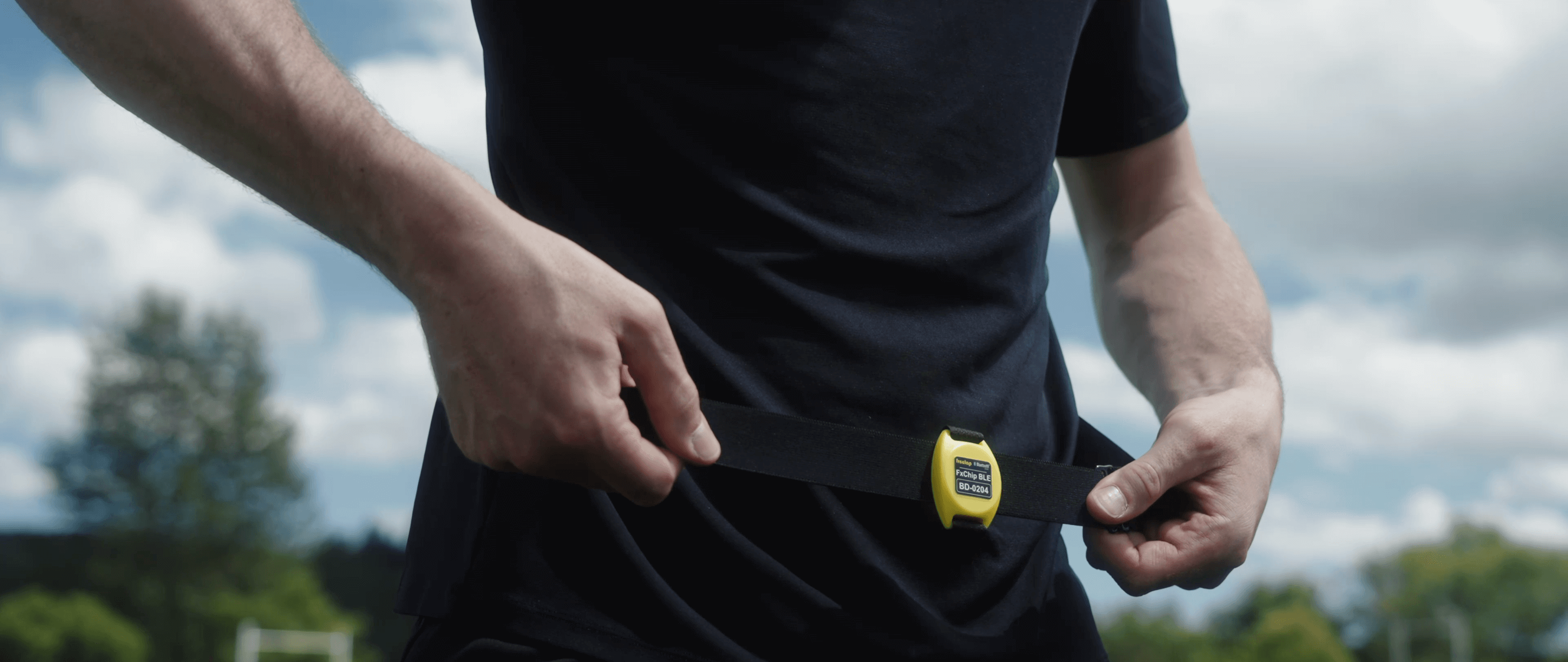 Freelap Canada soccer training – athlete wearing FxChip BLE with belt for wireless sprint timing and performance tracking on the field