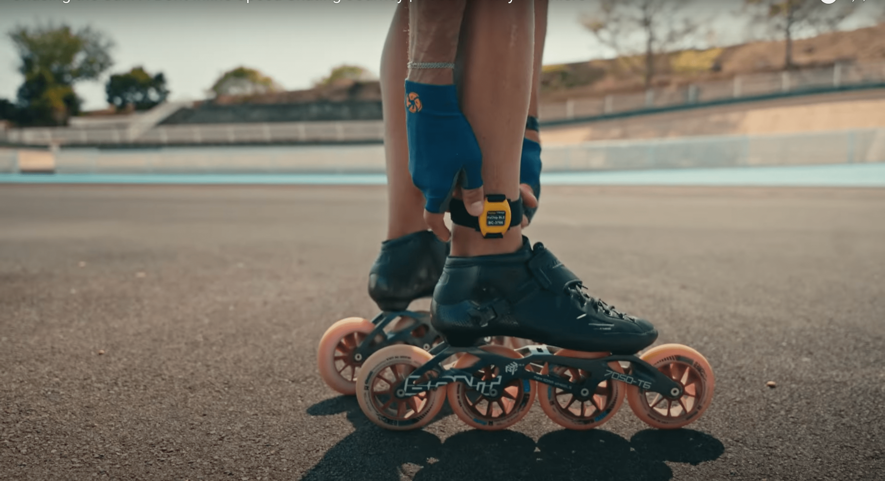 Freelap Canada wireless timing system used in summer speed skating training – athlete sprinting with FxChip BLE on track